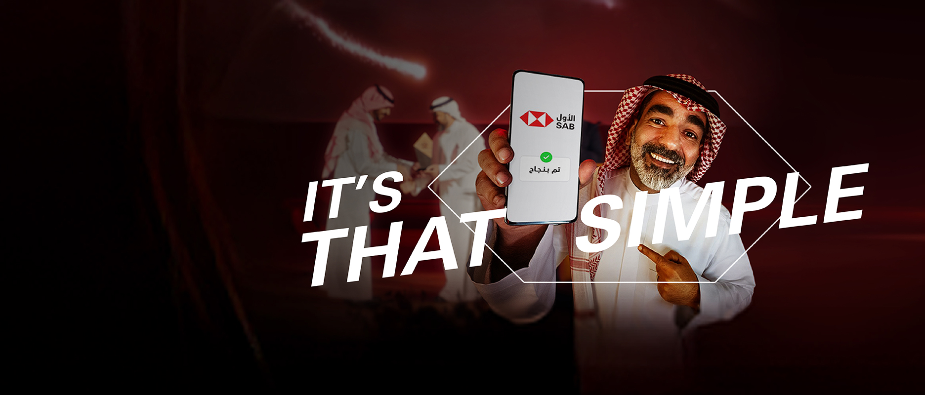 a saudi guy showing his phone with the word Baseetah
