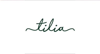 the image shows name brand Tilia in green ,and the background is white