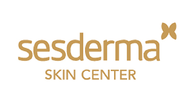 The image shows a logo for "Sesderma Skin Center." The text is written in a modern font, with "sesderma" in bold letters and "SKIN CENTER" in a smaller, lighter font below it. The background is white, and the text is in a golden-brown color.