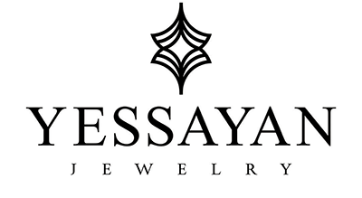 الصورة عبارة عن شعار Yessayan مكتوبة باللون الاسود  مع خلفيه ابيض